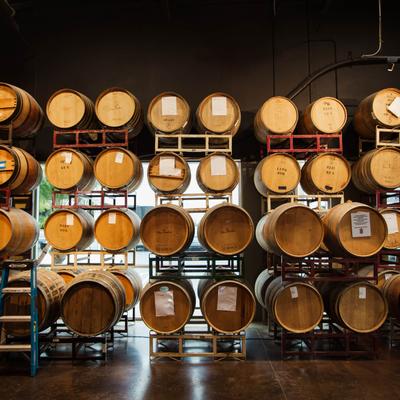 Pub interior, racks with wooden barrels.