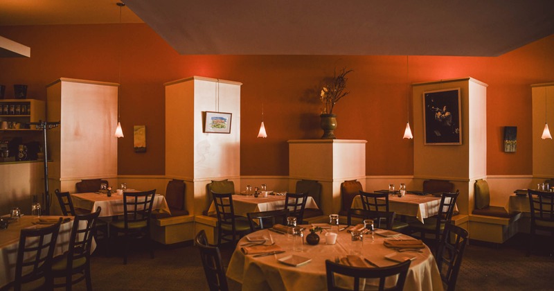 Interior, seating area with tables and chairs