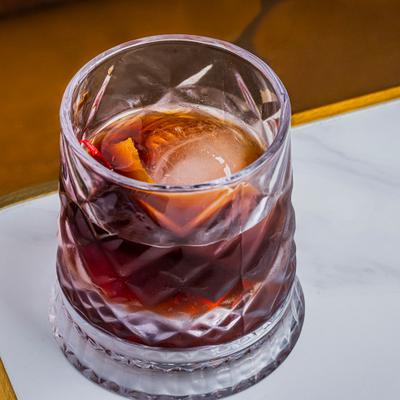 Manhattan cocktail served in a rocks glass.