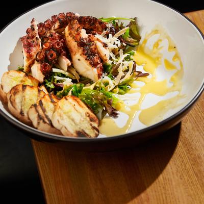 Grilled octopus plate, served.