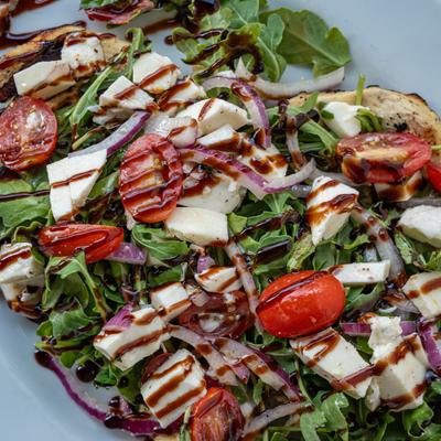 Grilled Chicken Caprese Salad, close up.