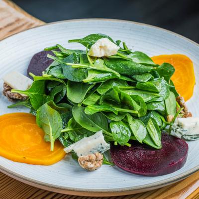 Beet Salad with spinach, gorgonzola, candied walnuts, and sherry vinaigrette.