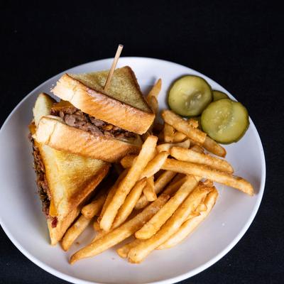 Smoked Brisket Grilled Cheese sandwich with fries.