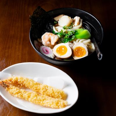 Shrimp tempura with chicken, scallop, mushroom, vegetables, fish cake, and egg.