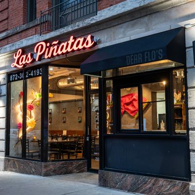 Exterior, angle view to restaurant and side walk.