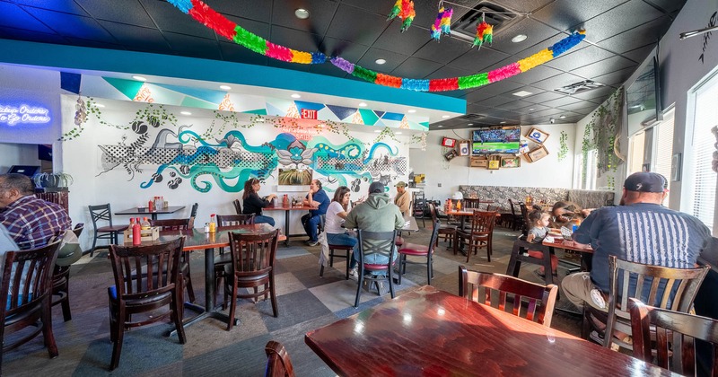 Interior, main seating area with guests