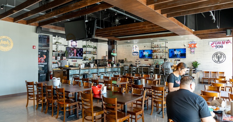 Interior, diner area, tables and chairs, wide view