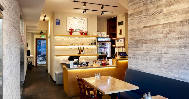 Interior, main dining area with counter in the back