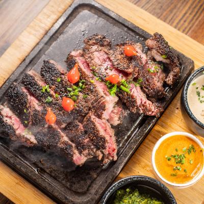 Ribeye steak with sides.