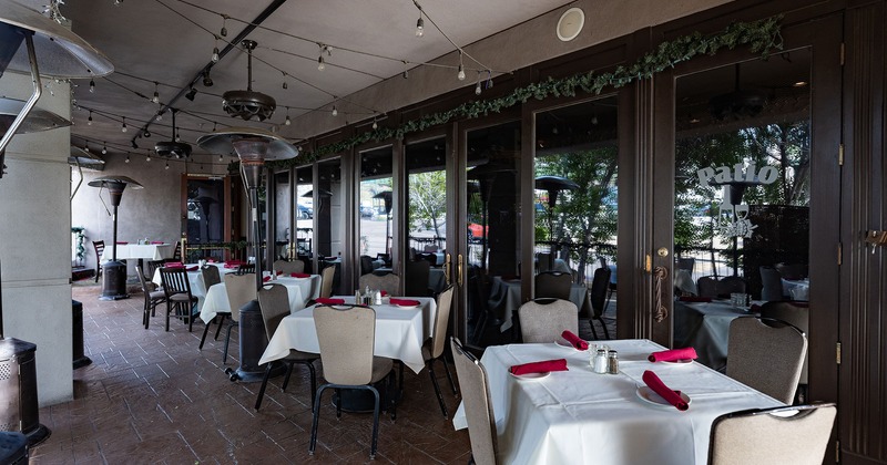 Covered patio with dining set tables