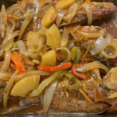 Brown Stew Fish dish, close up.