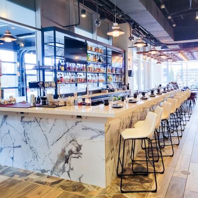 Interior, bar area with white stools