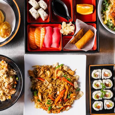 Assorted Japanese dishes on a table, top view.