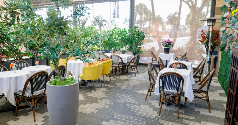Covered outdoor pario with chairs and tables