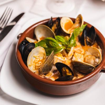 Mixed seafood in light tomato sauce.