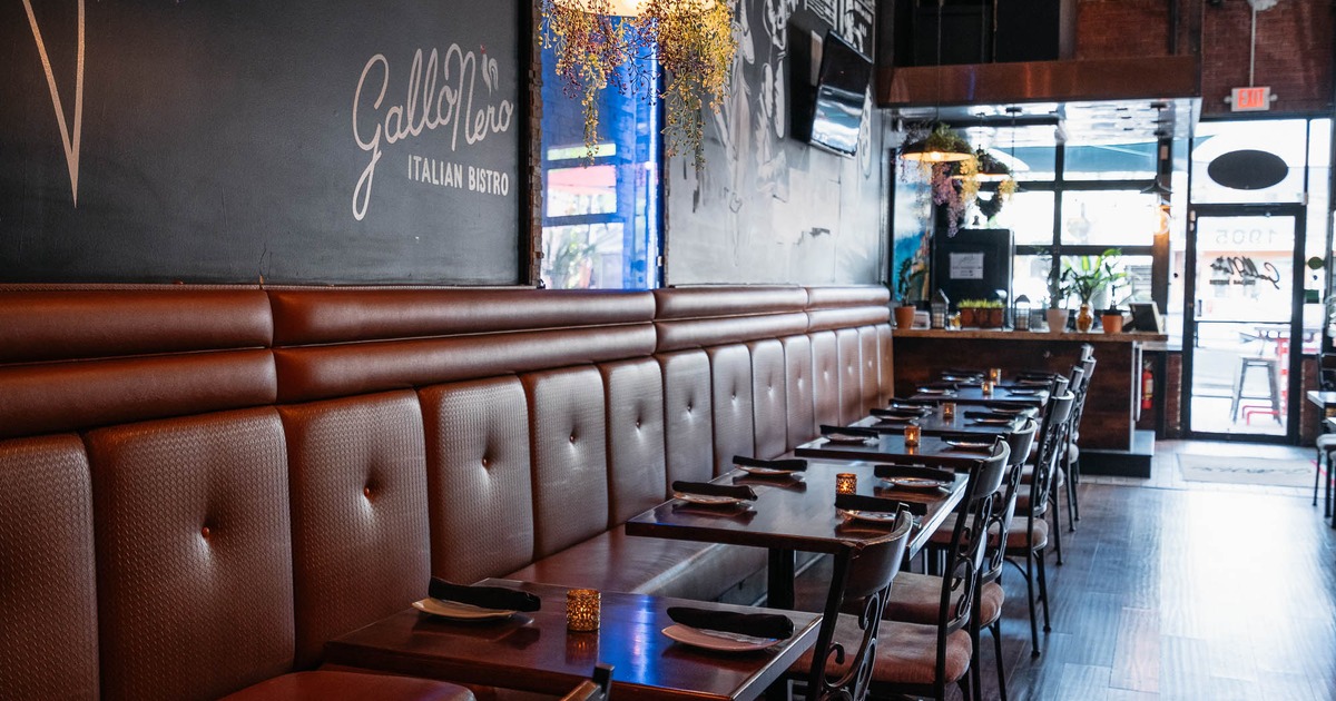 Interior, long banquette seating bench in dining area