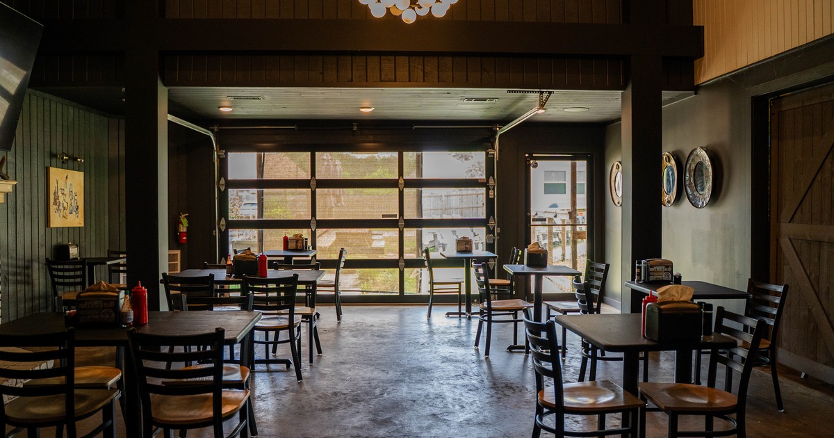 Interior, diner area, tables, chairs, wide view