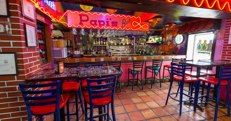 Interior, dining area, bar in the back