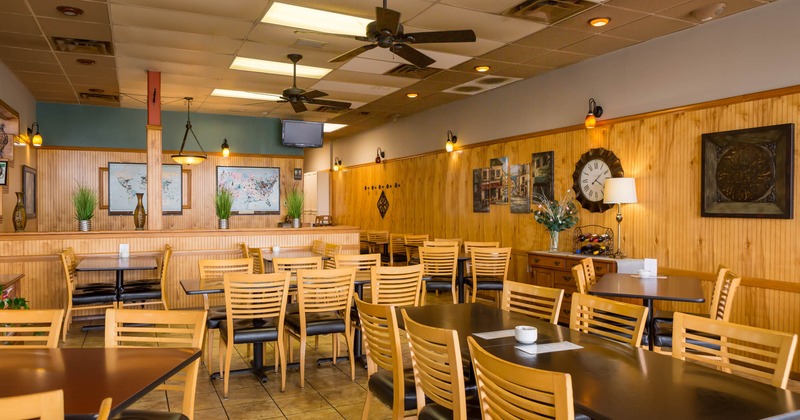 Interior, wooden tables and chairs, decoration on the walls