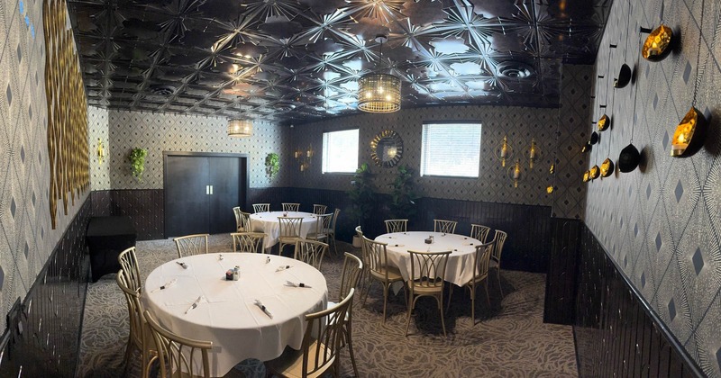 Interior, dining area, round tables for eight, carpet flooring