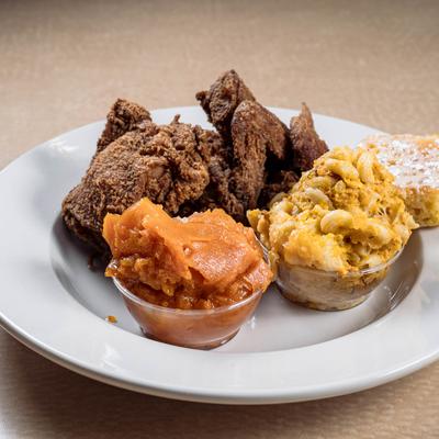 Crispy fried chicken, macaroni and cheese, cornbread, candied sweet potatoes.
