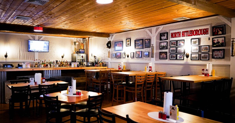 Interior, wide view, tables and chairs ready for guests
