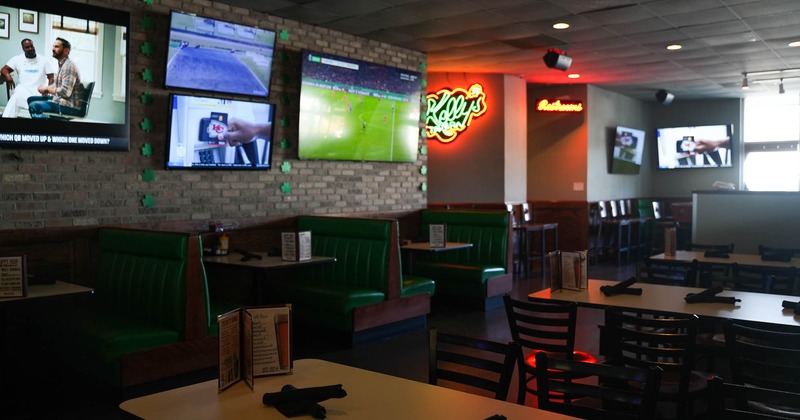 Interior, main seating space, big Tv's on the wall