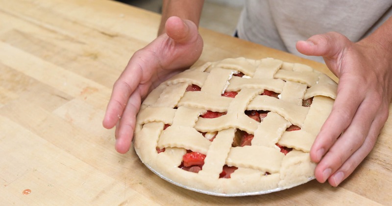 Finishing up making a strawberry rhubarb pie
