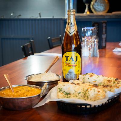 A table with served food and drinks.