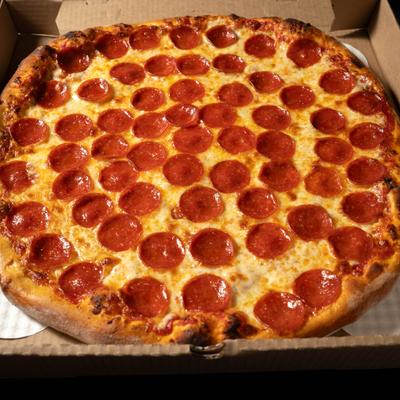 Whole Pepperoni pizza served inside a pizza box.