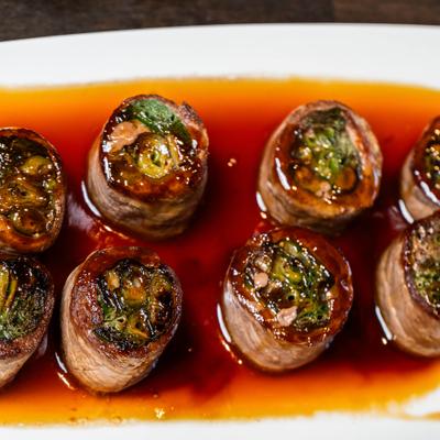 Beef and scallion rolls served with teriyaki sauce.