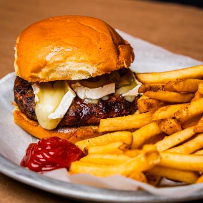 Tavern burger with fries, close up.