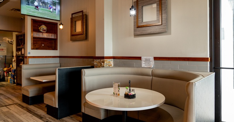 Restaurant interior, cozy upholstered dining booths