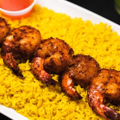 Grilled Shrimp on a bed of rice.