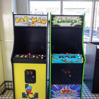 Two vintage arcade game machines.