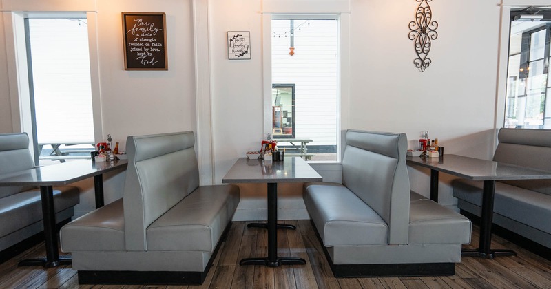 Interior, restaurant booths near windows