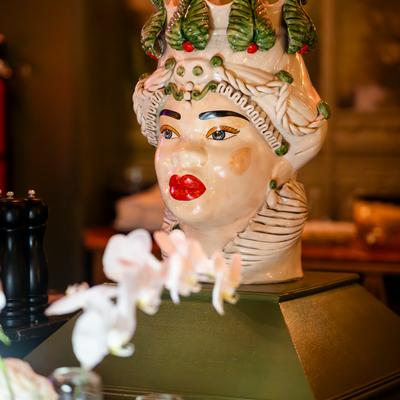 Decorative Asian-inspired statue displayed inside the restaurant.