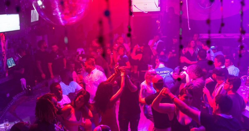 Interior, guests dancing