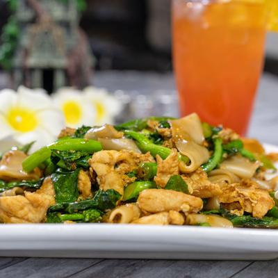 Stir fried Chinese broccoli with noodles.