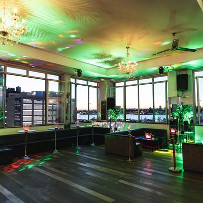 Seating area, green lighting.