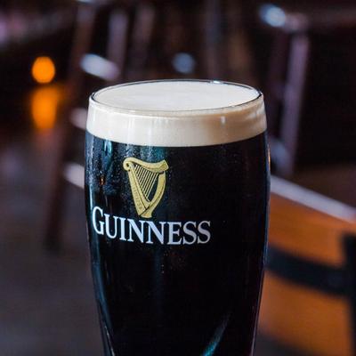 A glass of Guinness beer.