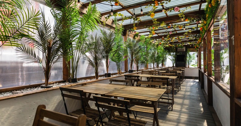Exterior, covered seating area, greenery decorations