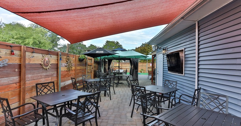 Exterior, tables, chairs and parasols