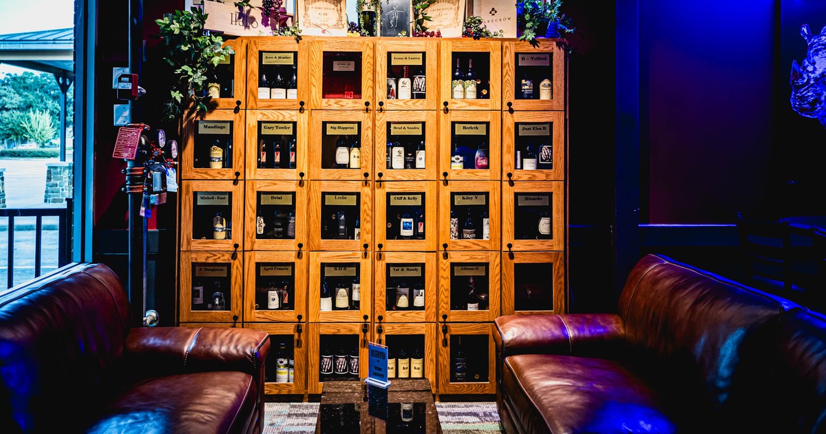 Interior, leather sofas with wine bottles for tasting