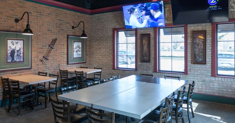 Interior seating area with a large table in the center
