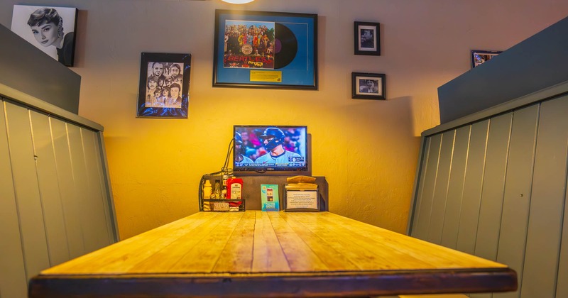 Booths with a small TV screen next to them