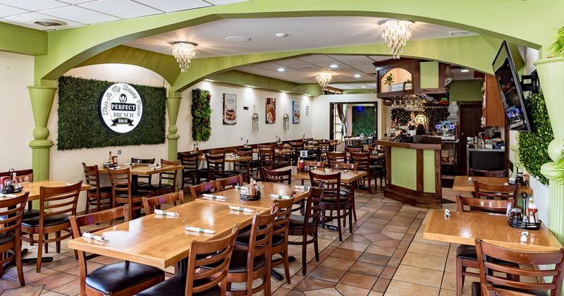 Spacious interior dining area with dining tables ready for guests