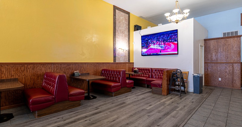 Interior, dining booths, TV on the wall