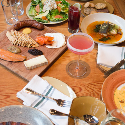 table filled with a variety of dishes and drinks