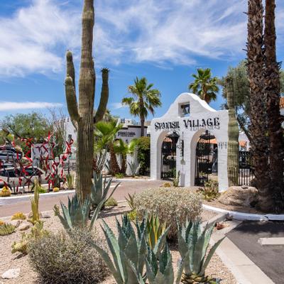 Exterior, restaurant front gate, trees, and cacti